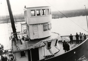 James E. Davidson - forward cabins and pilot house damaged after cutting across a steamer and barge's towline circa 1920