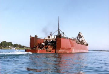 McKee Sons- October 1992 - stern view with tug Olive L. Moore attached, note low tug pilothouse