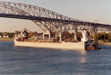 McKee Sons - October, 2000 - inbound to Port Huron/Sarnia under Blue Water Bridges, first round trip, note raised tug pilothouse, Joe Barr photo [copyrighted]