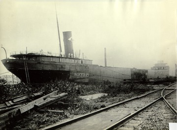 William C. Moreland 1916 rebuilding with new bow and mid-body, stern not yet refurbished with J & L logo still on stack.