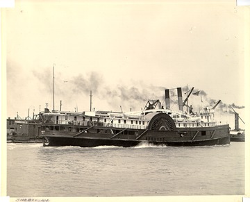 Starboard stern view, note sidewheel &#034;buckets&#034; that catch water and propel the vessel forward.