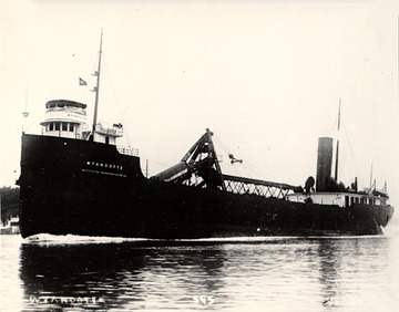 Portside view, in service, very earliest self-unloading freighter built as one.